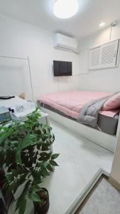 Phòng Giường Đôi Lớn Loại Sang (Deluxe Queen Room)