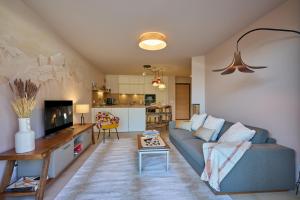 Appartements Le Miroir De Saint-Jacques : photos des chambres