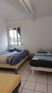Appartements T3 WALIBI : photos des chambres