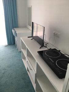 Waves & Whispers Apartments - acces gratuit piscina