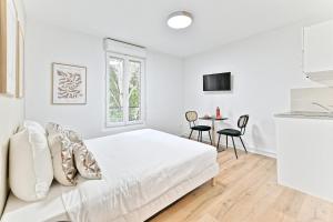 Appartements Charming little studio close to Paris- III : photos des chambres