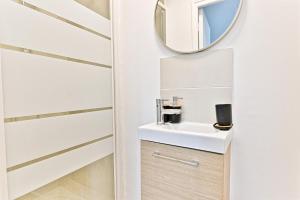 Appartements Charming little studio close to Paris- III : photos des chambres