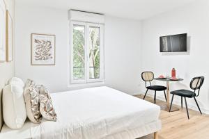 Appartements Charming little studio close to Paris- III : photos des chambres