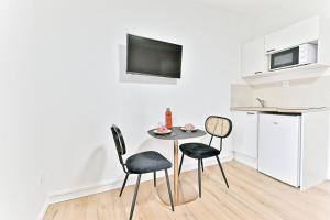 Appartements Charming little studio close to Paris- III : photos des chambres