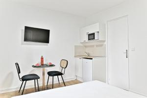 Appartements Charming little studio close to Paris- III : photos des chambres