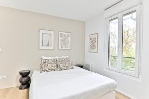 Appartements Charming little studio close to Paris- III : photos des chambres