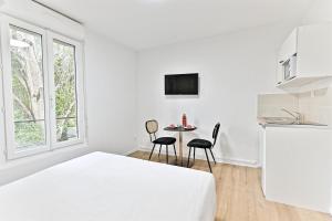 Appartements Charming little studio close to Paris- III : photos des chambres