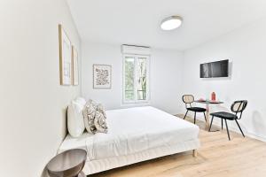 Appartements Charming little studio close to Paris- III : photos des chambres