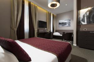Deluxe Triple Room room in Hotel Artemide