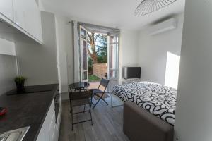 Appartements Studio cosy avec jardin privatif proche transport : photos des chambres