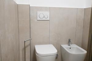 M415 Marcelli Trilocale piano terra con corte esterna