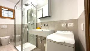 M415 Marcelli Trilocale piano terra con corte esterna