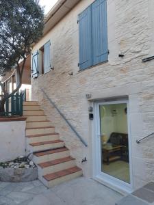 Maisons de vacances Jolie petite Maison, Clim, residence avec piscine a 5mn circuit Paul Ricard : photos des chambres