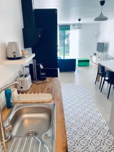 Maisons de vacances Charmante petite maison : photos des chambres