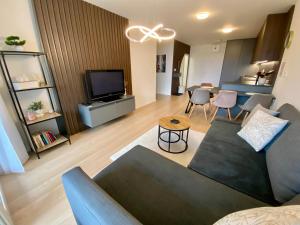 NEW apartment with free garage parking near the airport