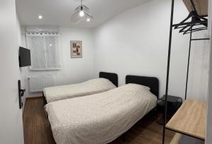 Appartements joli appartement T4 : photos des chambres