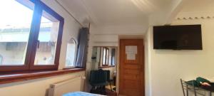 Appartements Studio 24m2 cosy classe, lit Queen Size, Netflix, wifi, 400m centre, parking, boite a cles, Gites La Tarine : photos des chambres