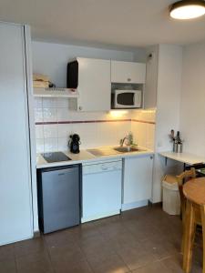 Appartements appartement avec vue sur le lac et les montagnes : photos des chambres