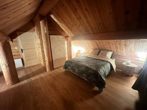 Chalets Wood log chalet : photos des chambres