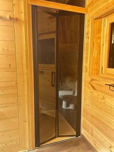 Chalets Wood log chalet : photos des chambres