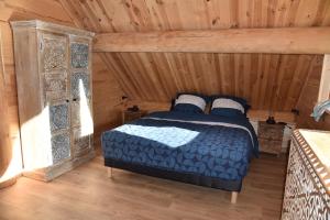 Chalets Wood log chalet : photos des chambres