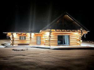 Chalets Wood log chalet : photos des chambres