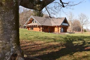 Chalets Wood log chalet : photos des chambres