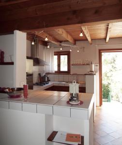 Appartements Les MAGNANS : photos des chambres
