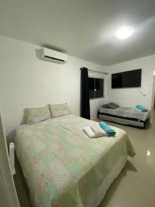 Apartamento térreo de frente para piscina - Pousada da Mel