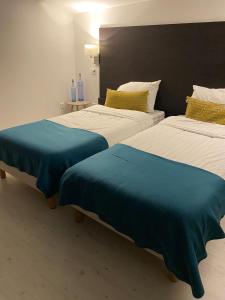 Appart'hotels Residence Cosyade equipee d'un parking prive gratuit : photos des chambres