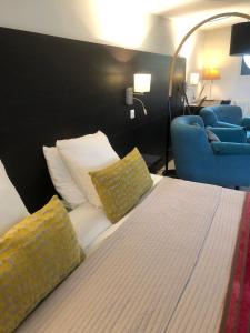 Appart'hotels Residence Cosyade equipee d'un parking prive gratuit : photos des chambres