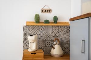 Appartements Au Cocon de J : photos des chambres