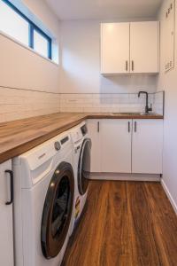 Contemporary Home with Ocean and Mountain Views