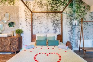 Appartements Le Nid d'Eliyah, suites avec jacuzzi 15min Disneyland Paris : photos des chambres