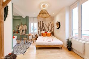 Appartements Le Nid d'Eliyah, suites avec jacuzzi 15min Disneyland Paris : photos des chambres