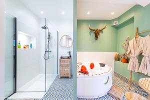 Appartements Le Nid d'Eliyah, suites avec jacuzzi 15min Disneyland Paris : photos des chambres