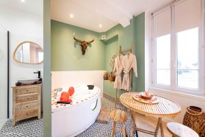Appartements Le Nid d'Eliyah, suites avec jacuzzi 15min Disneyland Paris : photos des chambres