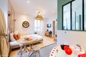 Appartements Le Nid d'Eliyah, suites avec jacuzzi 15min Disneyland Paris : photos des chambres