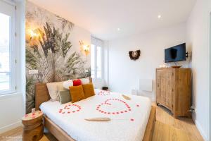 Appartements Le Nid d'Eliyah, suites avec jacuzzi 15min Disneyland Paris : photos des chambres