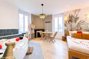Appartements Le Nid d'Eliyah, suites avec jacuzzi 15min Disneyland Paris : photos des chambres