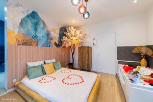 Appartements Le Nid d'Eliyah, suites avec jacuzzi 15min Disneyland Paris : photos des chambres