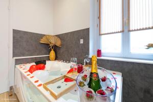 Appartements Le Nid d'Eliyah, suites avec jacuzzi 15min Disneyland Paris : photos des chambres