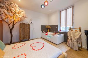 Appartements Le Nid d'Eliyah, suites avec jacuzzi 15min Disneyland Paris : photos des chambres