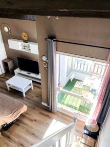 T2 mezzanine avec loggia vue montagne au Port de Saint-Cyprien