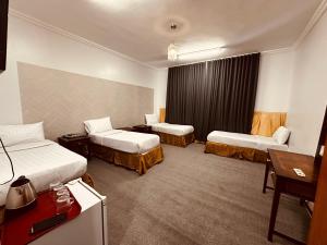 أثير الشعب للشقق والغرف المفروشة توصيل مجاني للحرم - Ather Al Shaab Rooms and Apartments Free shuttle service to the Haram