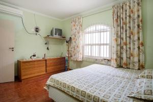 Casa em Caragua com piscina ar condicionado e estacionamento