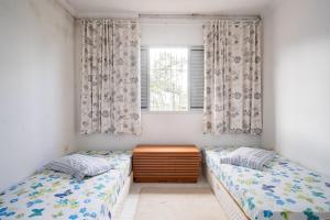 Casa em Caragua com piscina ar condicionado e estacionamento