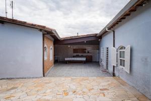 Casa em Caragua com piscina ar condicionado e estacionamento