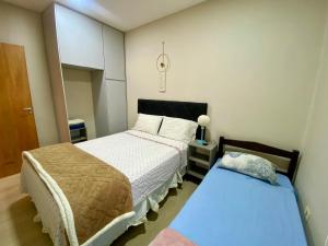 Apartamento RR Agradable y Moderno c 2 dormitorios y estacionamiento interno techado