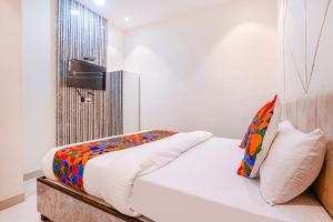 FabExpress Dhanlaxmi Residency